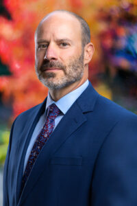 Headshot photo of attorney John Hoggan, taken on-location by Andrew Elder of Best Frame Forward.